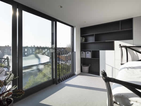 Modern living space with bright natural light at completion